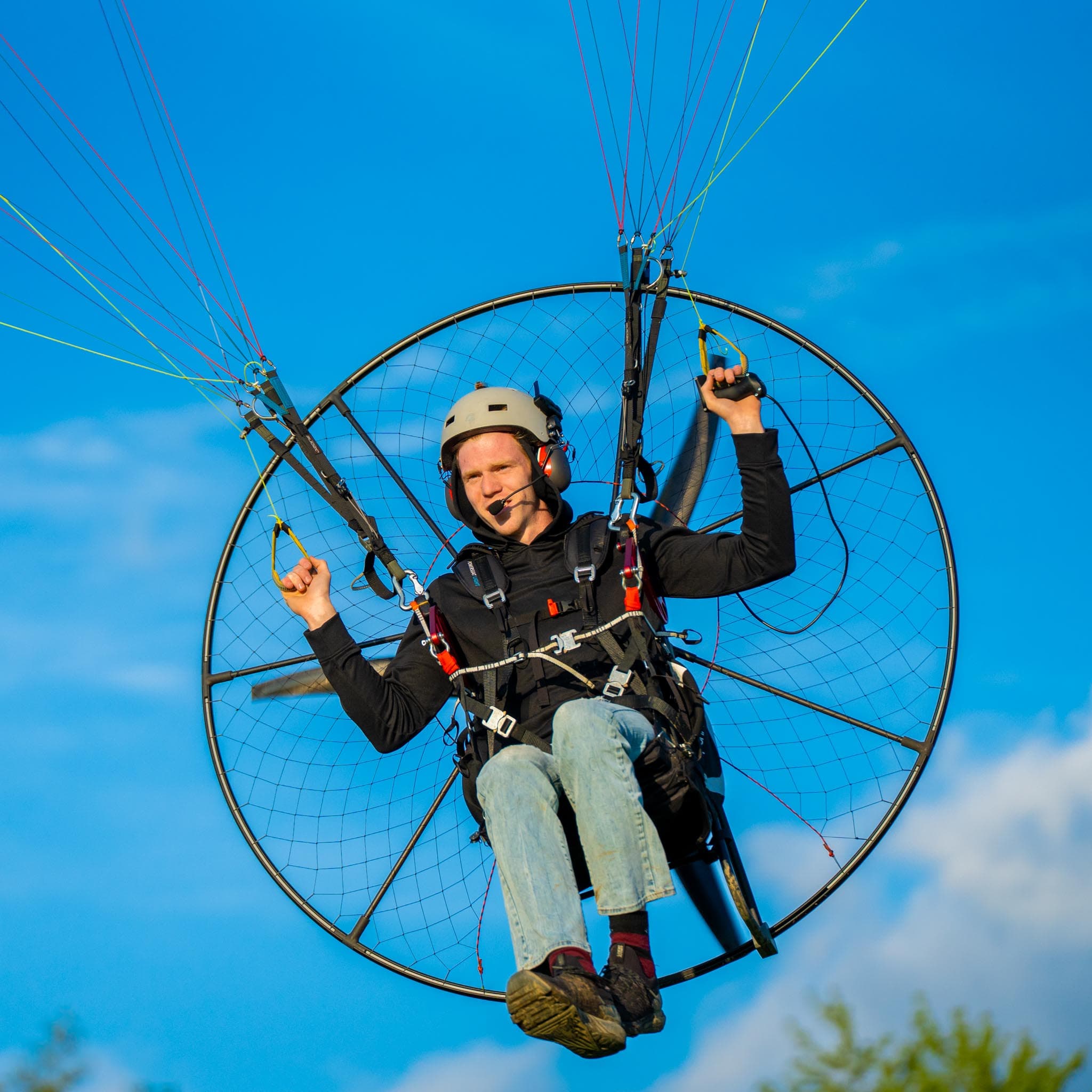 Paramotor pilots gathered in a community fly-in