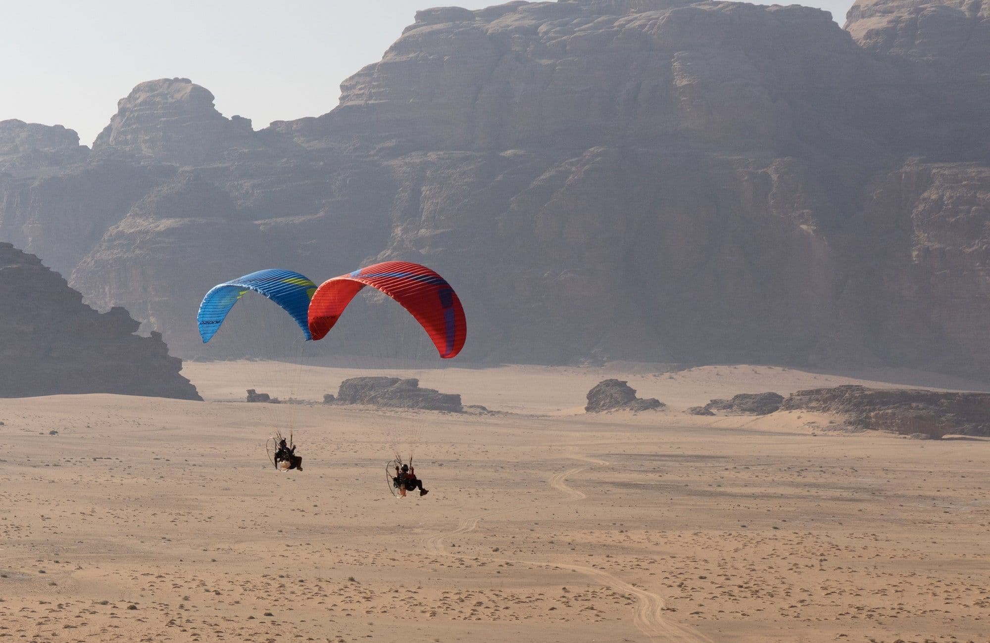 Flying with an OpenPPG paramotor high above the landscape